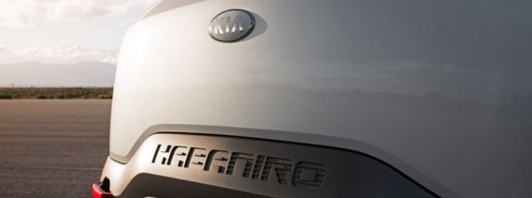 Closeup exterior view of the rear Kia and HabaNiro badging on a silver Kia HabaNiro Concept Electric Vehicle