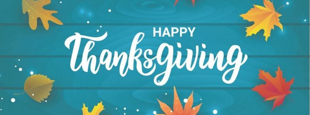 Happy Thanksgiving banner against a blue background with falling leaves