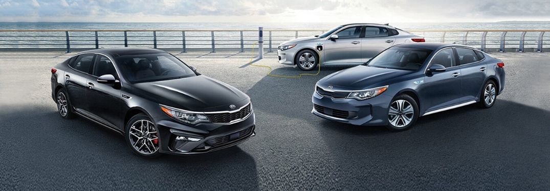 Exterior view of three 2020 Kia Optima models