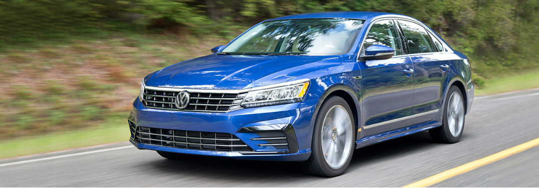2018 Volkswagen Passat in blue driving on the road