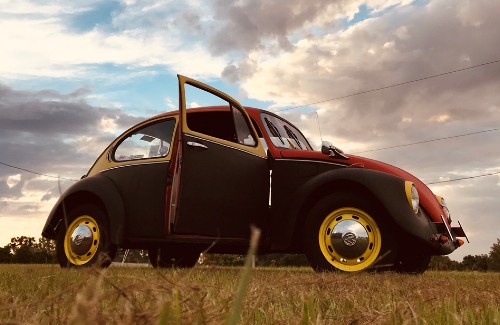 red black and yellow restored vw beetle
