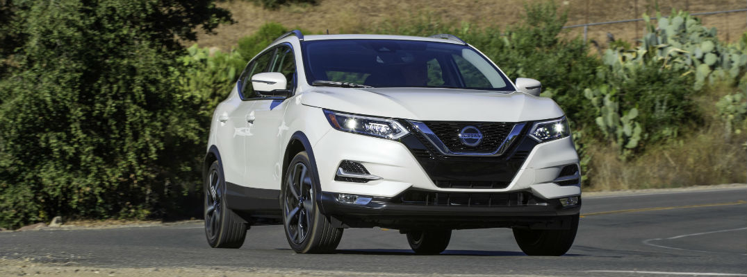 A head-on photo of the 2020 Nissan Rogue Sport parked on the road.