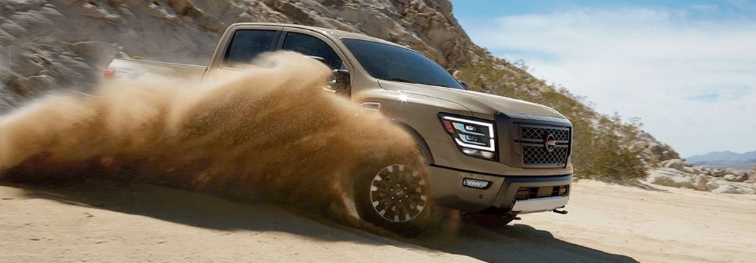2020 Nissan TITAN driving through dirt