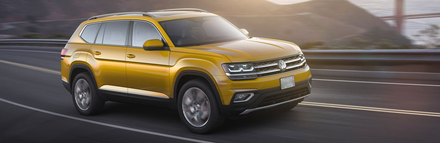 Yellow 2018 Volkswagen Atlas driving on the highway