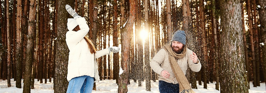 Couple smiling outside during winter