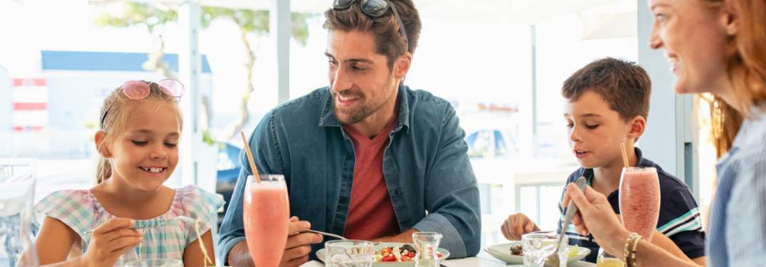 A family dining at a restaurant