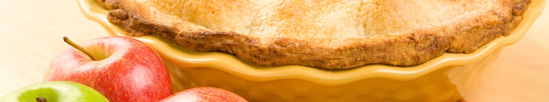 Fresh baked apple pie and apples