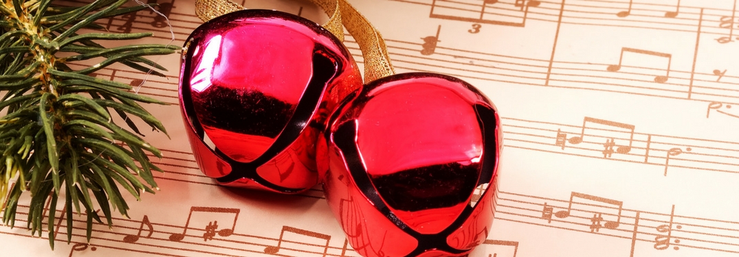 christmas ornament tree and sheet music