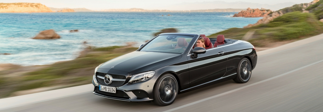 2019 mercedes-benz c-class coupe driving by water