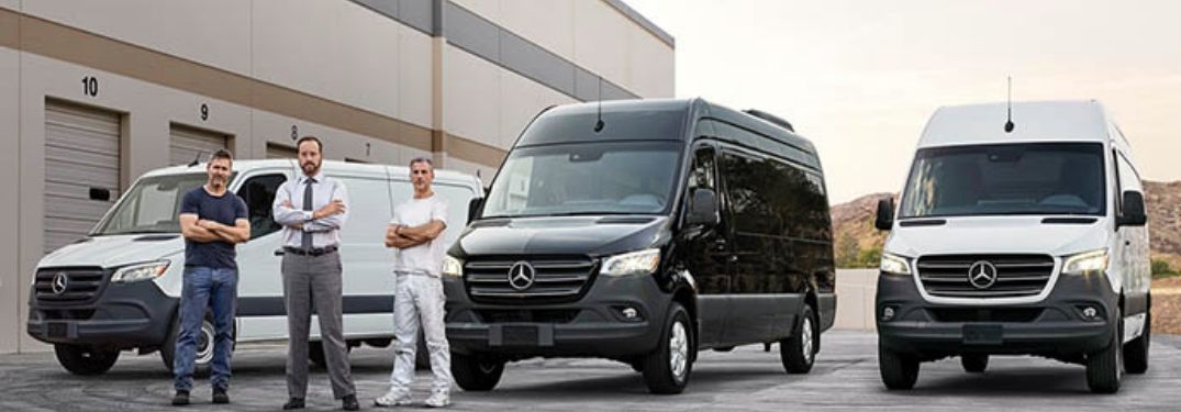 MB Sprinter Vans with people standing in the front