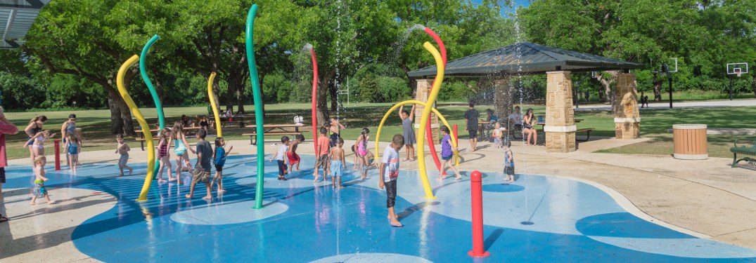 Public splash pad with kids