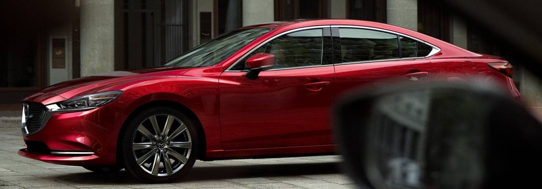2018 Mazda6 red side view through another car's side window