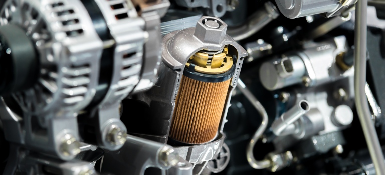 Engine oil filter cross section display inside machine motor in car