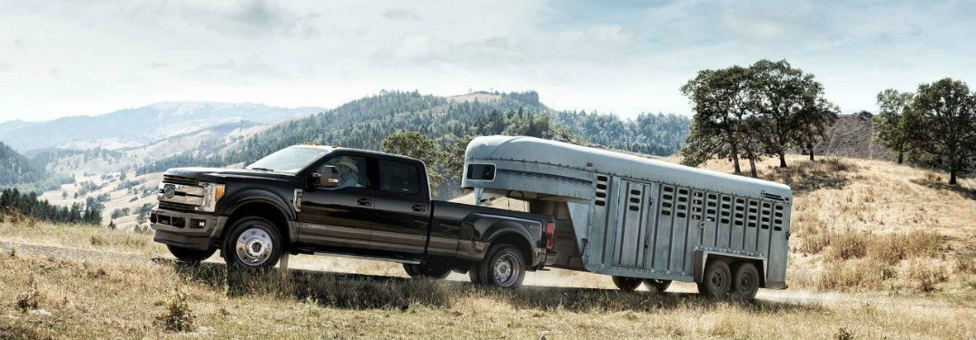 2018-Ford-Super-Duty-pulling-large-trailer-up-slight-incline