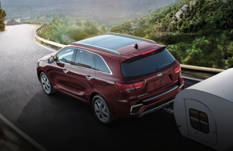 2020 Kia Sorento in red with trailer