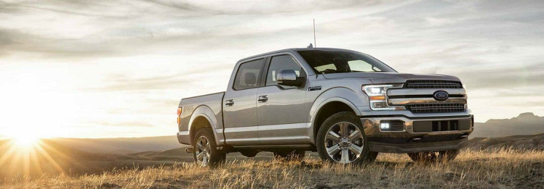 Passenger side exterior view of a gray 2018 Ford F-150
