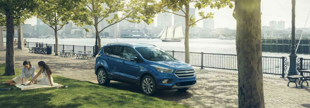 2018 Ford Escape exterior front fascia passenger side parked with girls on blanket in grass