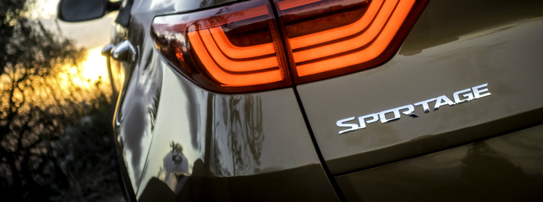 Close-up shot of 2018 Kia Sportage badging and tail light