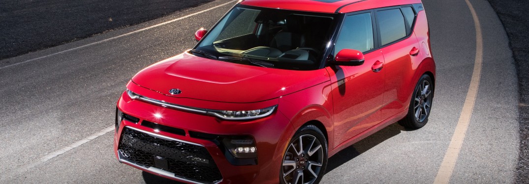 2021 Kia Soul red driving around corner close shot