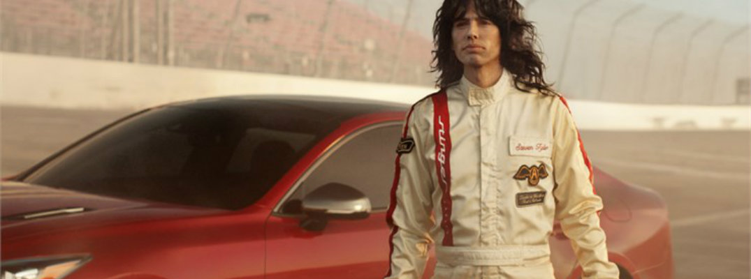 Steven Tyler with red 2018 Kia Stinger