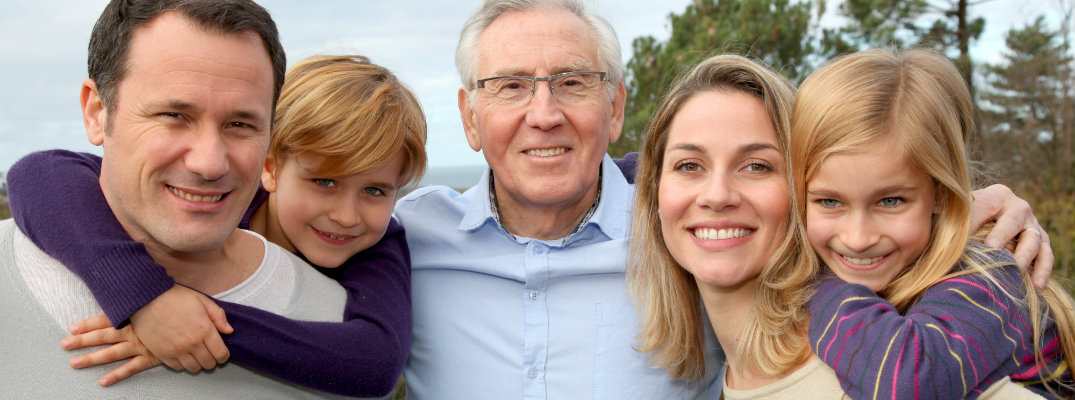 Smiling family getting ready for a road trip
