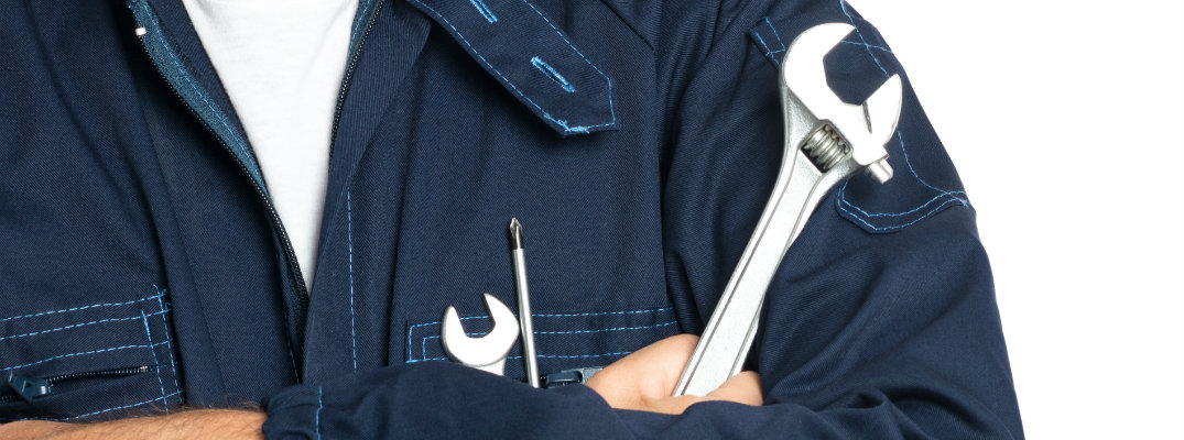 Mechanic holding a wrench