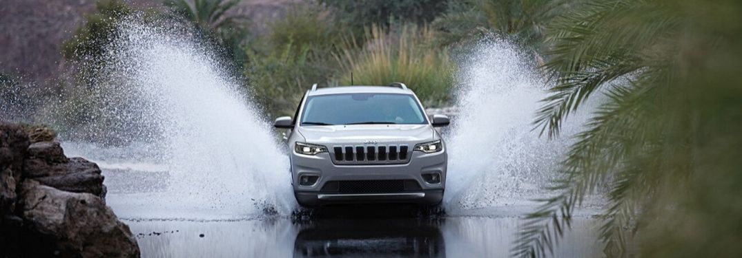 2020 Jeep Cherokee splashing through water