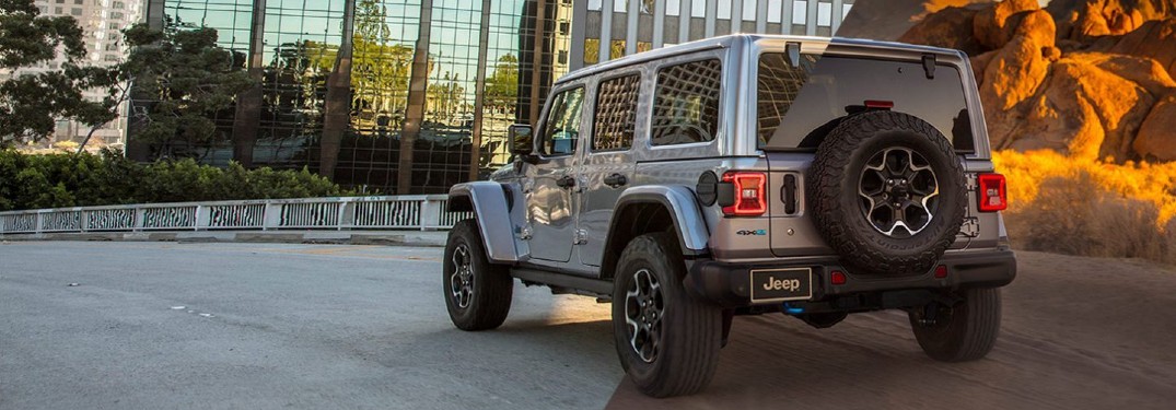 2021 Jeep Wrangler 4xe driving through desert and on city street