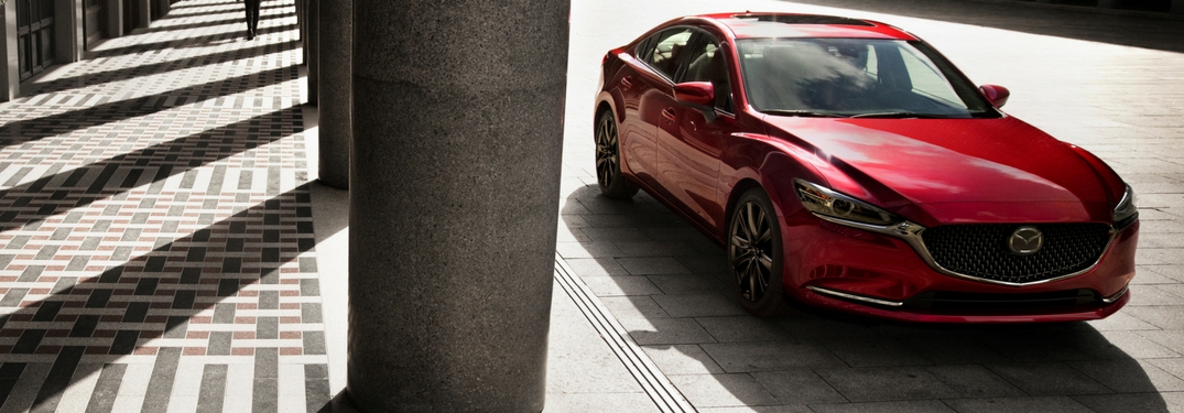 2018 mazda6 in soul red metallic parked