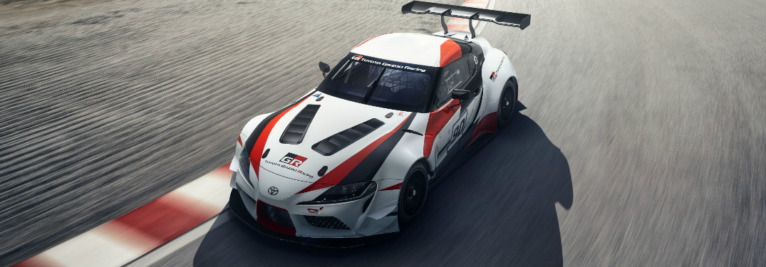 Toyota GR Supra Racing concept driving on a race track