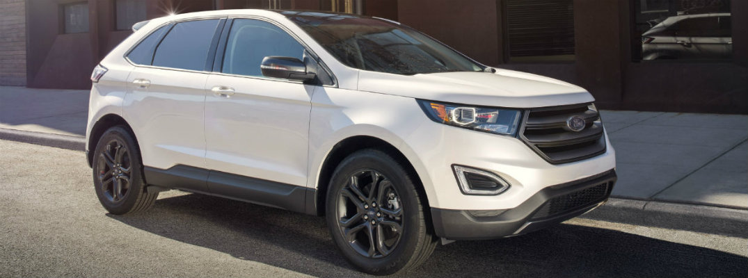 White 2018 Ford Edge parked on city street curb