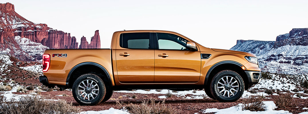 Profile view of 2019 Ford Ranger parked in front of mountainous backdrop