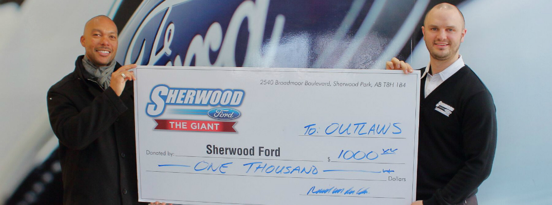 Sherwood Ford Presents Giant Check to Outlaws Lacrosse