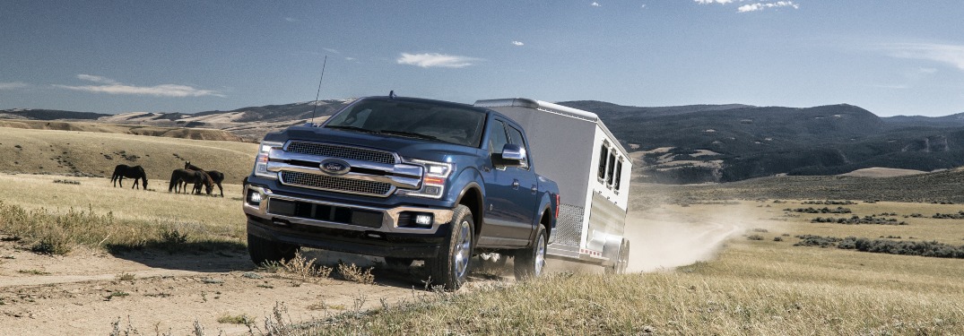 2020 Ford F-150 tows a camper across the plains