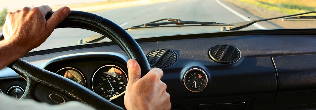 Driver behind the wheel of a car