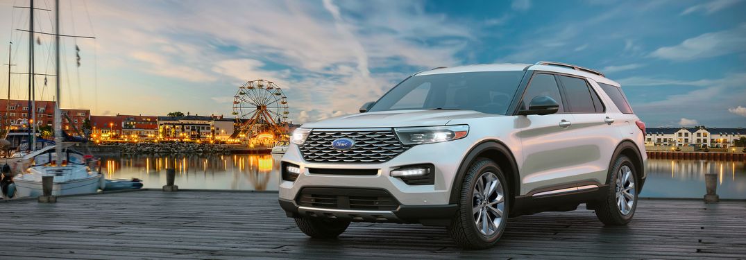 A 2022 Ford Explorer backdropped by a Ferris Wheel