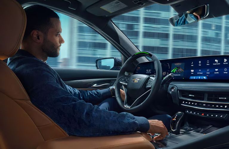 A man driving the 2026 Cadillac CT5