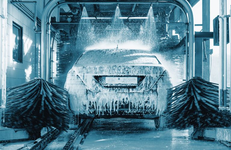 A car being washed in a car wash