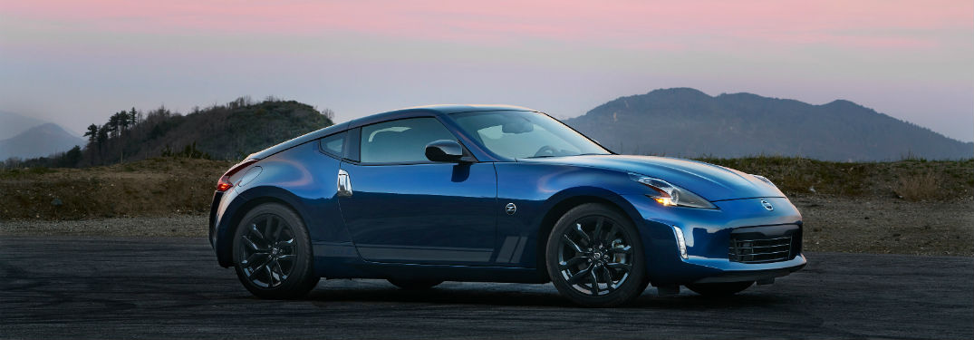 How much do the 2019 Nissan 370Z models cost? with image of a 2019 Nissan 370Z Heritage Edition parked with the sun setting