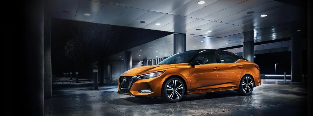 2020 Nissan Sentra orange paint parked inside building lit from above