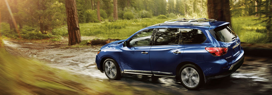 2020 Nissan Pathfinder driving on a dirt road