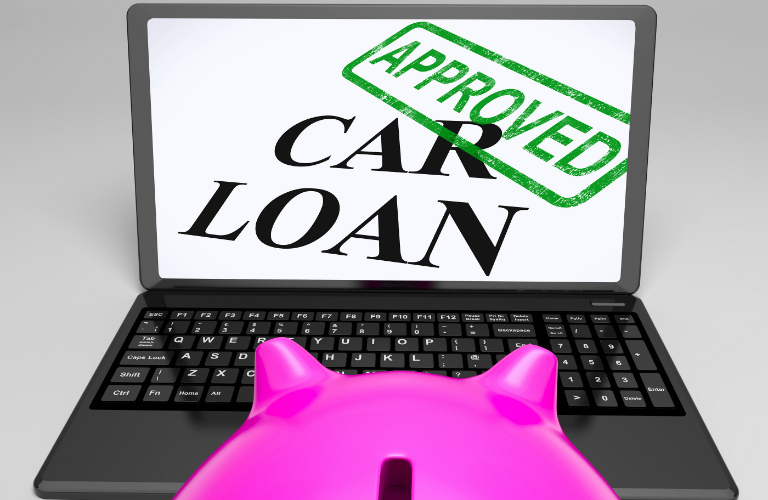 A computer screen with car loan approved text on it