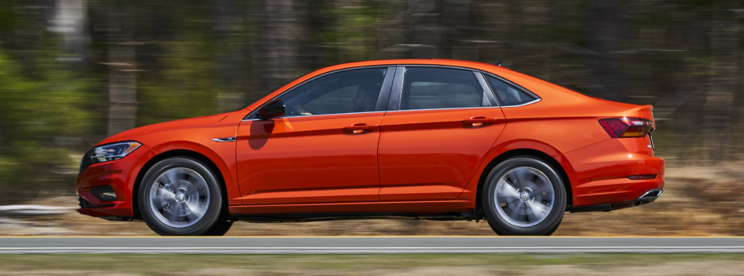 Side profile of orange 2019 Volkswagen Jetta