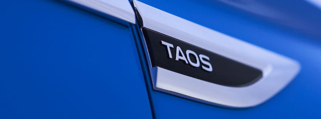A photo of the Taos badge used by the 2021 Volkswagen Taos.