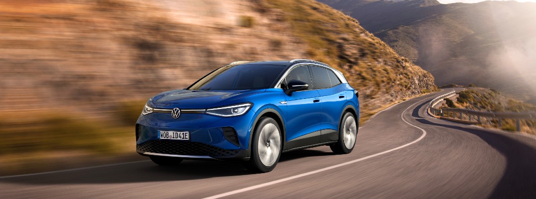 A photo of the 2021 Volkswagen ID.4 in motion on the road.