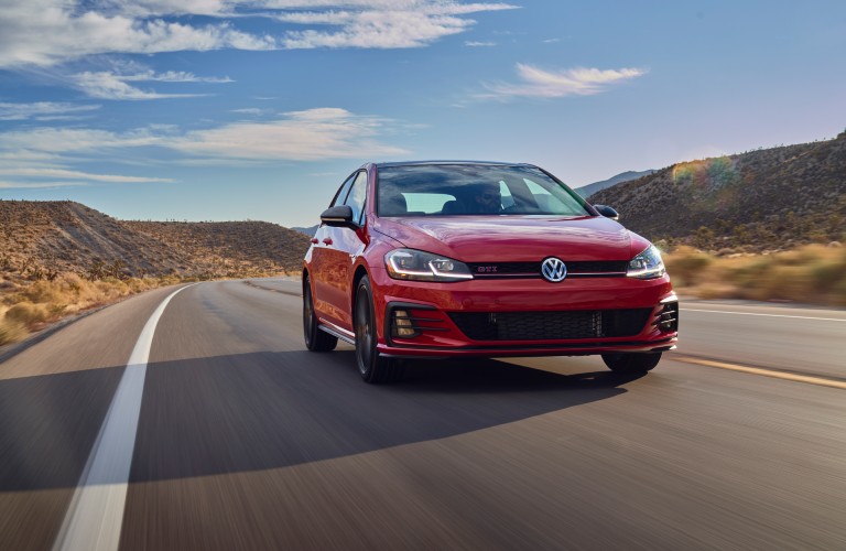 The 2021 Volkswagen Golf GTI on the road.