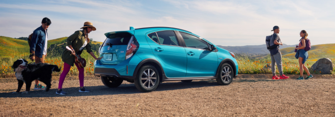 2018 Prius c parked near hikers