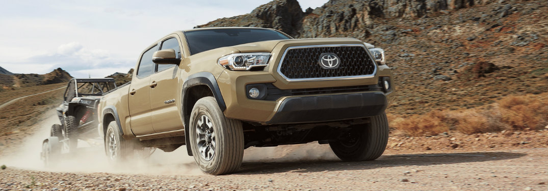 2018 Toyota Tacoma towing a dune buggy