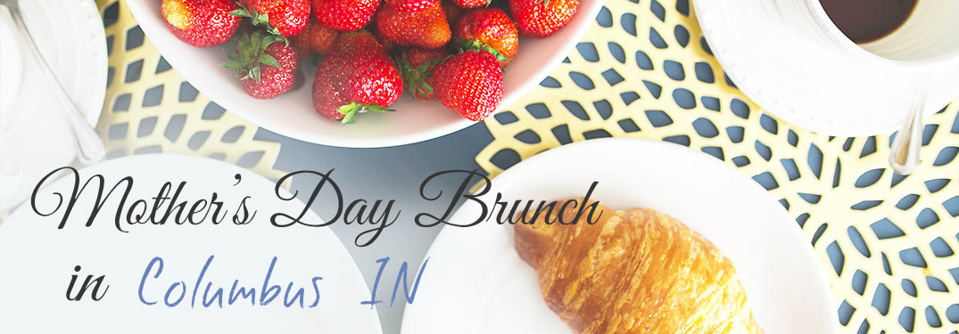 strawberries and croissants with Mother's Day Brunch in Columbus IN text