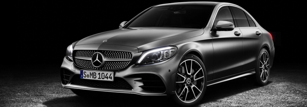 Gray 2019 Mercedes-Benz C-Class on a black background